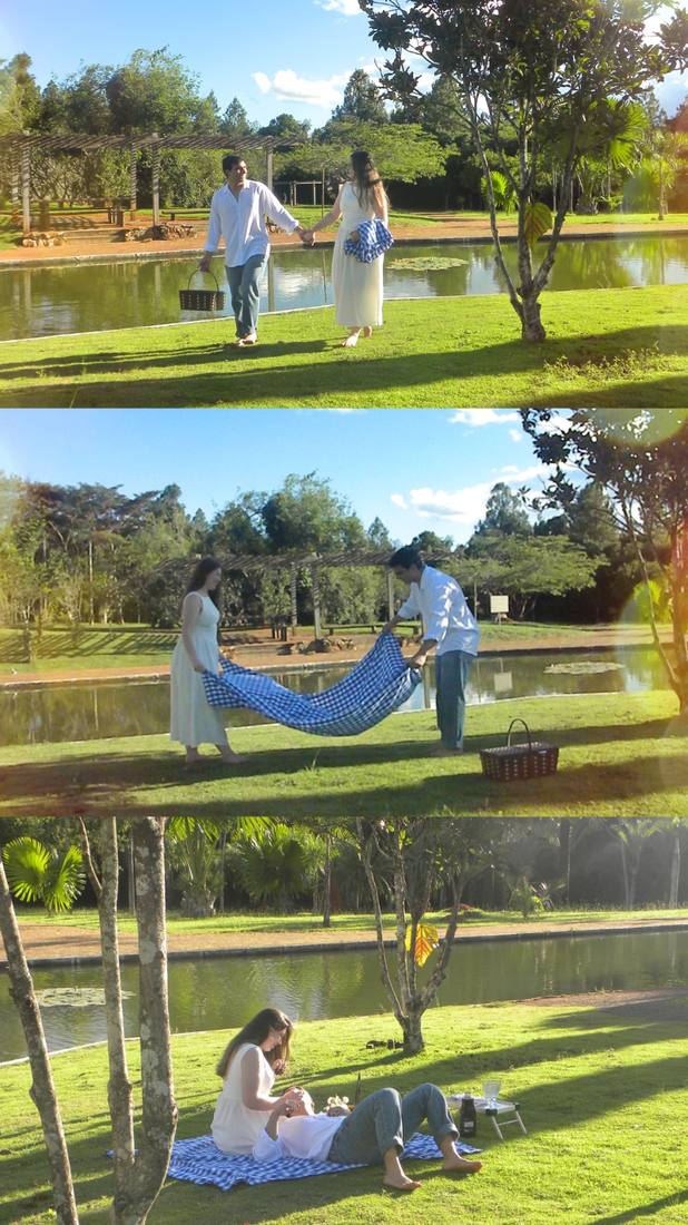 Casal rindo sentado na grama